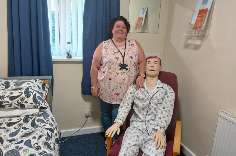  Jo Booker from City of Doncaster Council with ‘Sam’ the new medical manikin in Aspire to Be’s mock social care room.