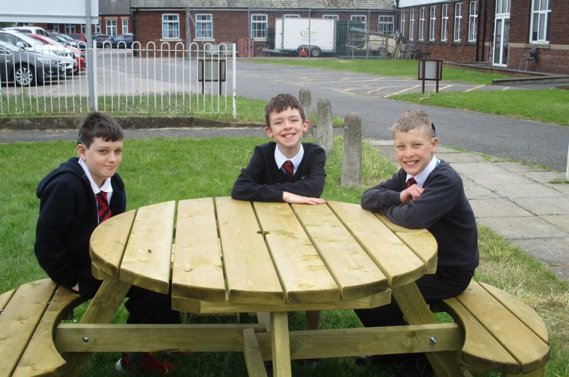 Pupils at Doncaster School for the Deaf enjoy the new benches