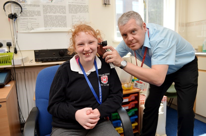 Dickson School for the Deaf pupil with the Audiologist