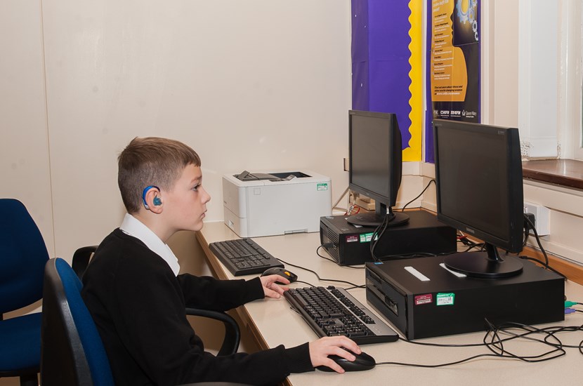 Doncaster School for the Deaf pupil working on the computer