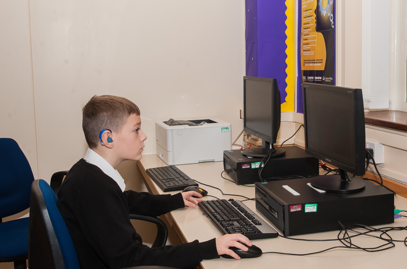 Doncaster School for the Deaf pupil working on the computer