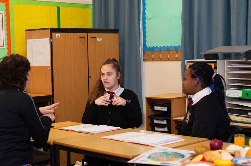 Doncaster School for the Deaf pupils signing with their teacher